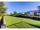 Artificial turf dog park in the community providing a clean and enjoyable space for pets at 2456 Arbor Wind Dr, Lutz, FL 33558
