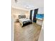 This cozy bedroom offers a comfortable bed, a TV with scenic views, and stylish decor for a relaxing retreat at 2606 E 97Th Ave, Tampa, FL 33612