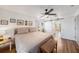Inviting bedroom with stylish accents and a view to the ensuite bathroom at 2611 San Luis Rd, Holiday, FL 34691