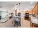 Modern kitchen with stainless appliances, granite counters, and ample cabinet space at 2611 San Luis Rd, Holiday, FL 34691