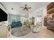 Inviting living space featuring tile floors and comfortable seating arrangements at 2611 San Luis Rd, Holiday, FL 34691