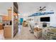 Open living space showcases a vaulted ceiling and decorative wall accents at 2611 San Luis Rd, Holiday, FL 34691