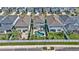 Beautiful houses next to each other, with pools and patios, and lush lawns from an aerial view at 28809 S Orange Berry S Dr, Wesley Chapel, FL 33543