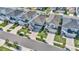 An aerial view of a suburban neighborhood featuring well-manicured lawns and organized street layout at 28809 S Orange Berry S Dr, Wesley Chapel, FL 33543