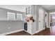 Stylish bar area with cabinets, mini-fridge, and elegant decor at 28809 S Orange Berry S Dr, Wesley Chapel, FL 33543