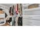Walk-in closet featuring organized storage solutions and ample hanging space at 28809 S Orange Berry S Dr, Wesley Chapel, FL 33543