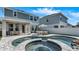 Inviting pool and spa combination with a covered patio and comfortable seating for enjoying the backyard oasis at 28809 S Orange Berry S Dr, Wesley Chapel, FL 33543
