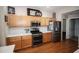 Modern kitchen featuring stainless steel appliances, ample cabinet space, and solid surface countertops at 29650 Eagle Station Dr, Wesley Chapel, FL 33543