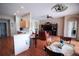 Inviting open-concept living space seamlessly connects kitchen and living area for modern living at 29650 Eagle Station Dr, Wesley Chapel, FL 33543