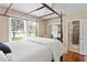 Traditional bedroom with a four poster bed and nice natural light at 3404 W Leona St, Tampa, FL 33629