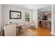 Bright dining area with hardwood floors and a view into the kitchen at 3404 W Leona St, Tampa, FL 33629