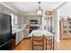 Kitchen boasts large island and stainless steel appliances with neutral tones at 3404 W Leona St, Tampa, FL 33629