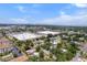 Charming single-story home nestled within a vibrant community near downtown, showcased in an expansive aerial view at 3919 W Paxton Ave, Tampa, FL 33611