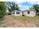 A spacious backyard, offering ample space for outdoor activities at 3919 W Paxton Ave, Tampa, FL 33611