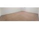 This cozy bedroom has neutral carpet and trim and lots of natural light at 3919 W Paxton Ave, Tampa, FL 33611