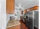 Well-equipped kitchen featuring stainless steel appliances and granite countertops at 3919 W Paxton Ave, Tampa, FL 33611