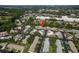 An aerial view showcases the property's location in a residential community at 4039 La Pasida Ln, New Port Richey, FL 34655