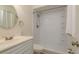 The bathroom has a single sink vanity and tiled walk-in shower at 4039 La Pasida Ln, New Port Richey, FL 34655