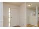 The entryway showcases neutral wall colors and hardwood flooring at 4039 La Pasida Ln, New Port Richey, FL 34655