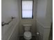 Bathroom featuring a toilet at 405 Lemonwood Dr, Englewood, FL 34223