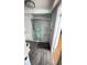 Bright bathroom with a glass-enclosed shower, tile flooring, and modern fixtures at 4851 W Gandy Blvd # B7L23, Tampa, FL 33611