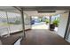 A look through the carport, showing the driveway and neighborhood at 4851 W Gandy Blvd # B7L23, Tampa, FL 33611