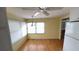 Light filled dining area with a view from the window and laminate flooring at 4851 W Gandy Blvd # B7L23, Tampa, FL 33611