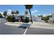 Attractive single-story home featuring a red front door, mature landscaping, and a well-maintained exterior at 4851 W Gandy Blvd # B7L23, Tampa, FL 33611