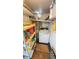 Laundry room with modern appliances and ample shelving for supplies at 4851 W Gandy Blvd # B7L23, Tampa, FL 33611