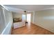 Inviting living room with wood-look flooring, ceiling fan, and ample natural light at 4851 W Gandy Blvd # B7L23, Tampa, FL 33611