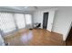 Bright office space with wood-look floors, desk, and natural light at 4851 W Gandy Blvd # B7L23, Tampa, FL 33611