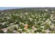 A picturesque aerial shot of a home nestled in a lush, green neighborhood close to the bay at 5800 3Rd S St, St Petersburg, FL 33705