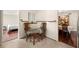 Cozy breakfast nook with a glass-top table, wicker chairs, and a view of the dining area at 5800 3Rd S St, St Petersburg, FL 33705
