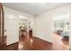 Bright, open living space showing hardwood floors, natural light, and interior architecture at 5800 3Rd S St, St Petersburg, FL 33705
