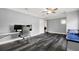 Bedroom with laminate flooring, a desk and chair set up, and a window seat at 6219 Wendell Dr, Wesley Chapel, FL 33544