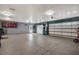 Spacious garage with multiple doors, ample lighting, and plenty of room for parking at 6219 Wendell Dr, Wesley Chapel, FL 33544