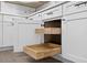 Close-up of kitchen cabinets with pull-out drawers at 6310 Gainsboro Ave, Spring Hill, FL 34609