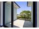 Balcony with modern railings and scenic neighborhood views at 6530 Simone Shores Cir, Apollo Beach, FL 33572