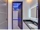 Modern bathroom features sleek fixtures, contemporary design, and ample lighting at 6530 Simone Shores Cir, Apollo Beach, FL 33572