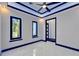 Bright bedroom with modern trim and several windows for ample natural light at 6530 Simone Shores Cir, Apollo Beach, FL 33572
