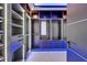 Custom walk-in closet with ample shelving, drawers, and lighting for optimal organization and storage at 6530 Simone Shores Cir, Apollo Beach, FL 33572