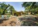 The property features a private backyard patio for relaxing with mature landscaping and an additional storage shed at 6618 N 11Th St, Tampa, FL 33604