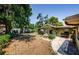Expansive backyard with a shed, seating and abundant space, perfect for outdoor activities and enjoying nature at 6618 N 11Th St, Tampa, FL 33604