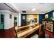 Dining area with a view into the kitchen and living room, highlighting the open floor plan at 6618 N 11Th St, Tampa, FL 33604
