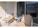 Outdoor patio with chairs at 6817 Stones Throw N Cir # 17203, St Petersburg, FL 33710
