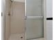 This bathroom features tile floors, and a shower with sliding door at 6817 Stones Throw N Cir # 17203, St Petersburg, FL 33710