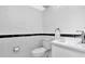 Clean bathroom featuring white subway tile and updated fixtures at 6817 Stones Throw N Cir # 17203, St Petersburg, FL 33710