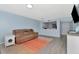 Comfortable living room with an open view to the kitchen and plenty of natural light at 6817 Stones Throw N Cir # 17203, St Petersburg, FL 33710