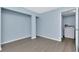 This room features blue walls, and a utility area at 6817 Stones Throw N Cir # 17203, St Petersburg, FL 33710