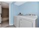 A utility area with a door to the bathroom at 6817 Stones Throw N Cir # 17203, St Petersburg, FL 33710